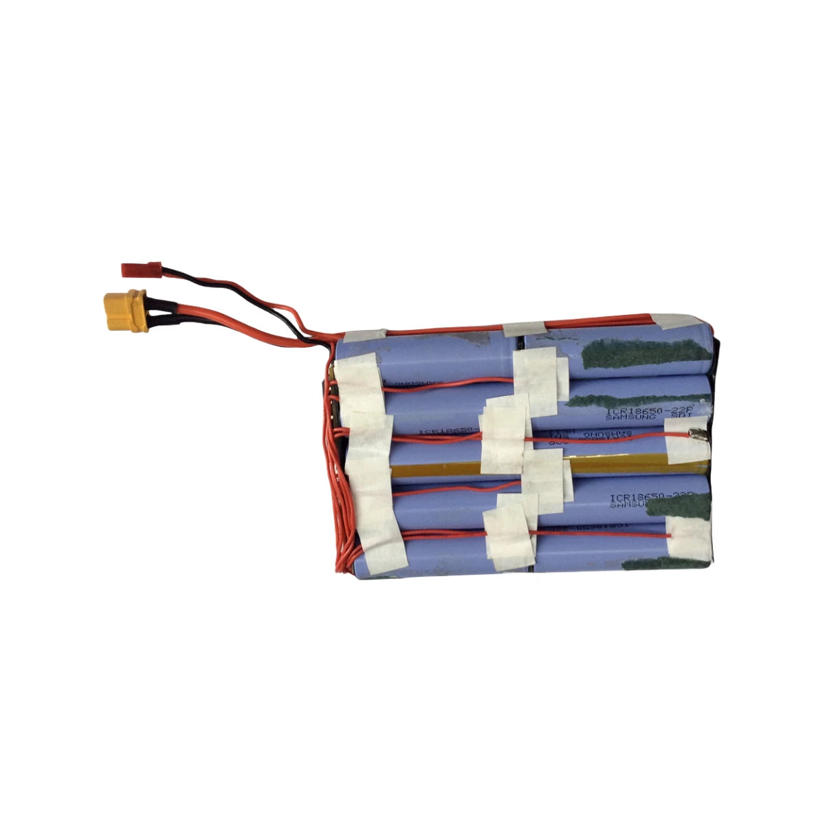 Electric skateboard battery pack with exposed 18650 cells and wiring layout