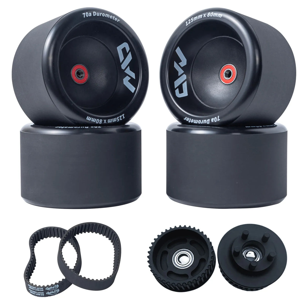 Mad Max 125mm Wheels complete drive kit including four 125mm wheels, CNC 40T pulleys, and belts for smooth and reliable electric skateboard performance