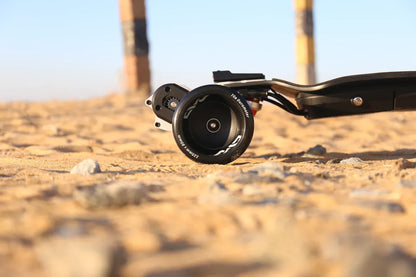 Mad Max 125mm Wheels installed on an electric skateboard delivering a smooth and comfortable ride on uneven roads