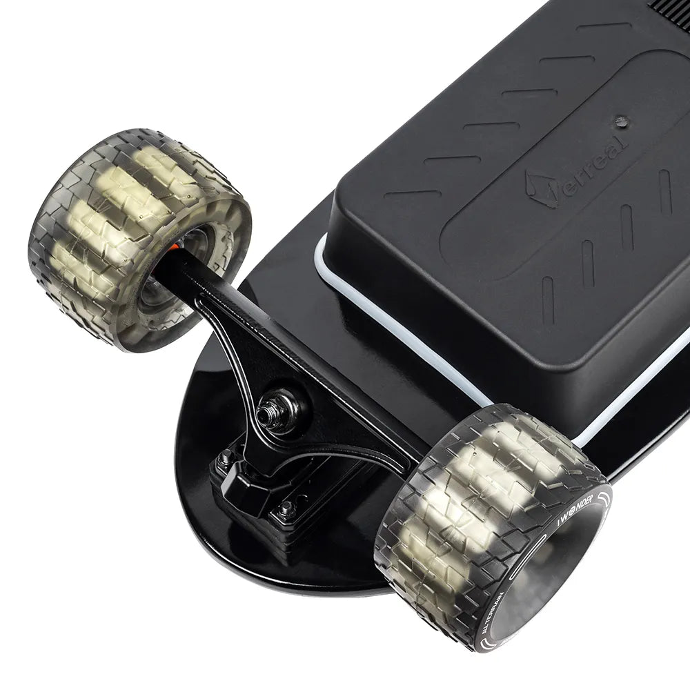 Detail shot of the front truck and 105mm Cloudwheels on the Verreal ACE, the perfect portable electric skateboard for college campus travel.