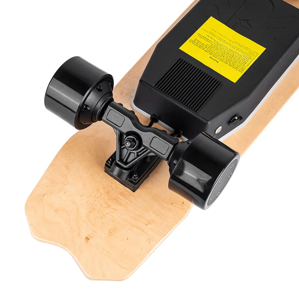 Close-up of Verreal Mini's durable trucks and deck bottom, designed for stability and easy carrying.